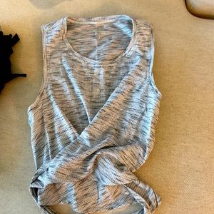 Only wore x2. wear to work out/just a cute athletic top! Crisscross back/front